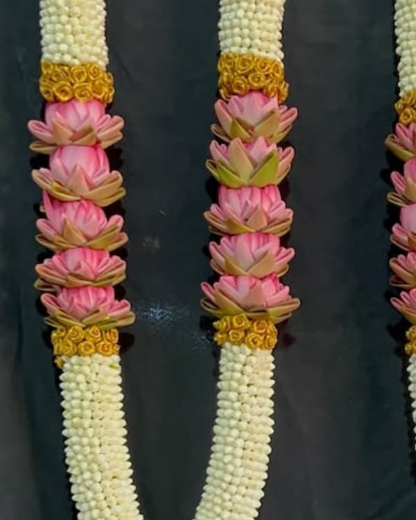 Sri Garlands lotus wedding garlands with gold accents